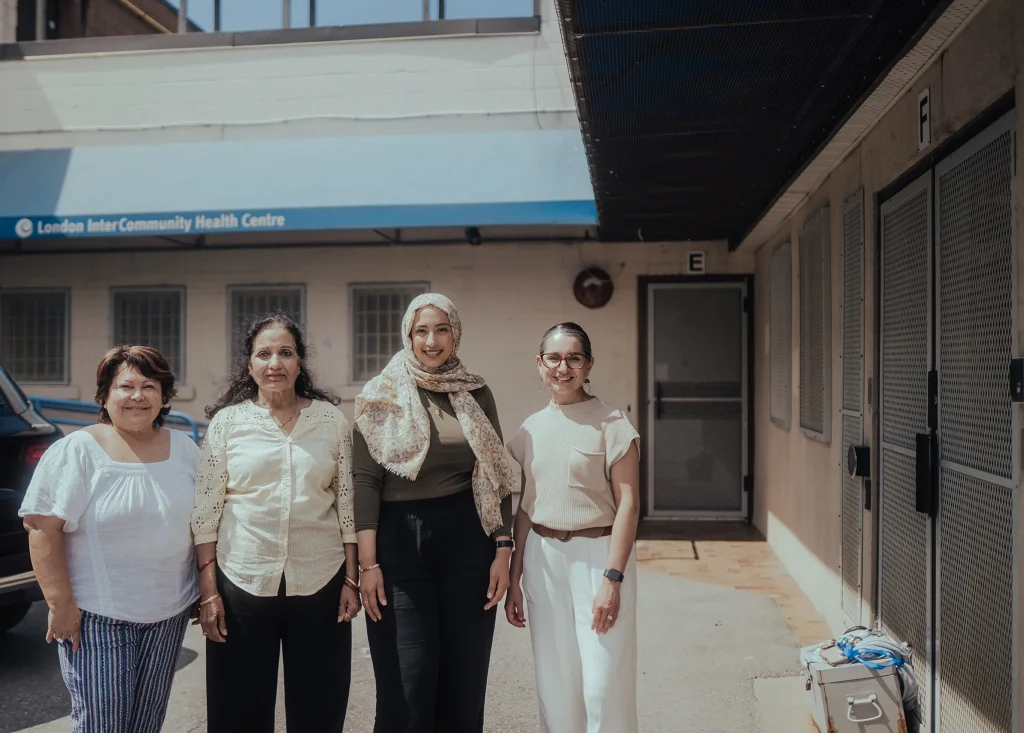 several people outside of a building