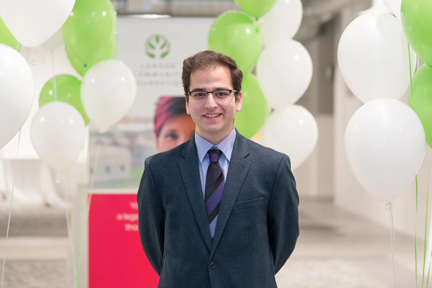 young man wearing a suit