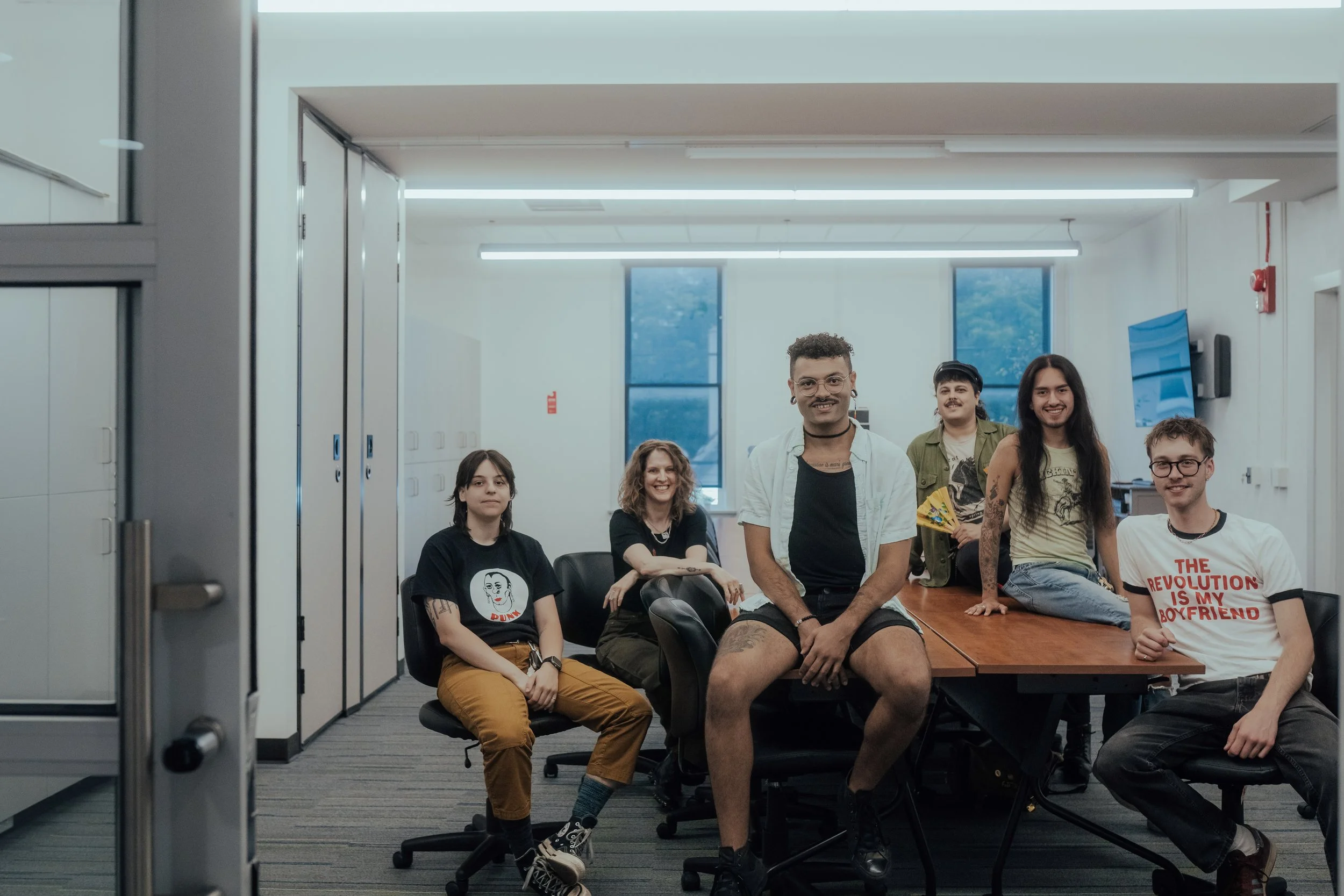 people sitting around a conference table