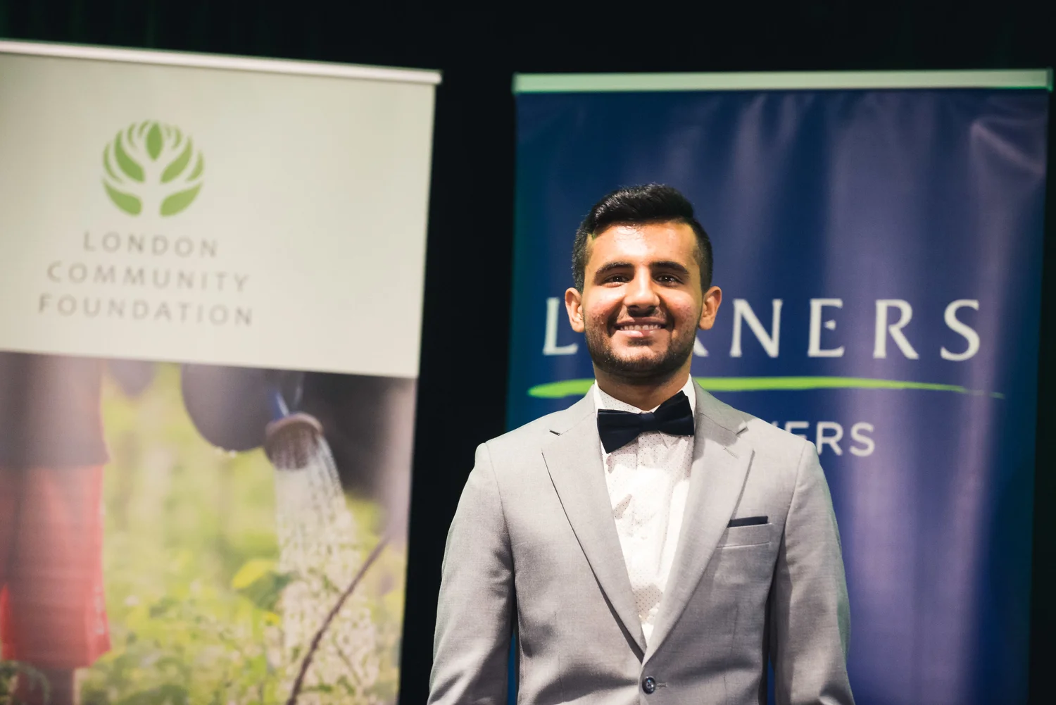 young man wearing suit London Community Foundation