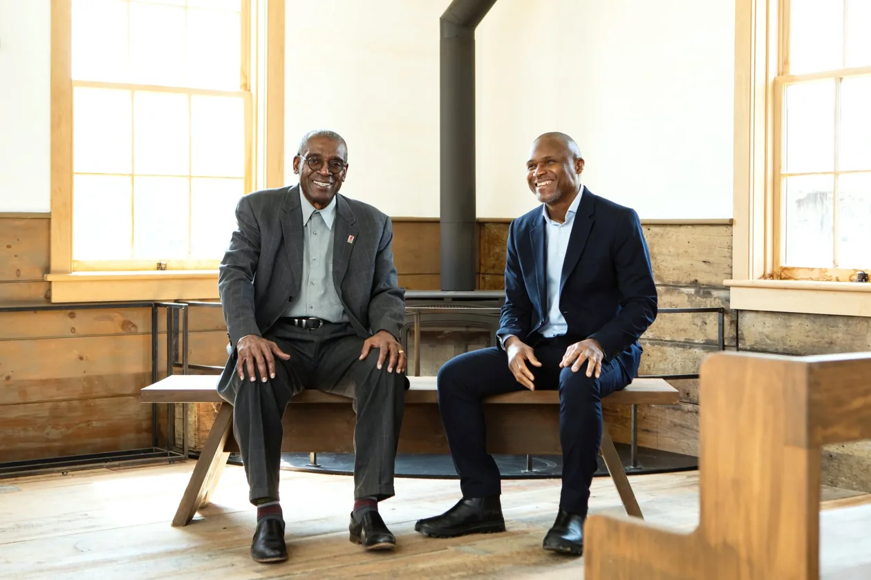 Two men sitting on a bench